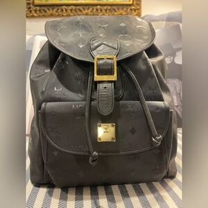 MCM Black Backpack with Gold Accents